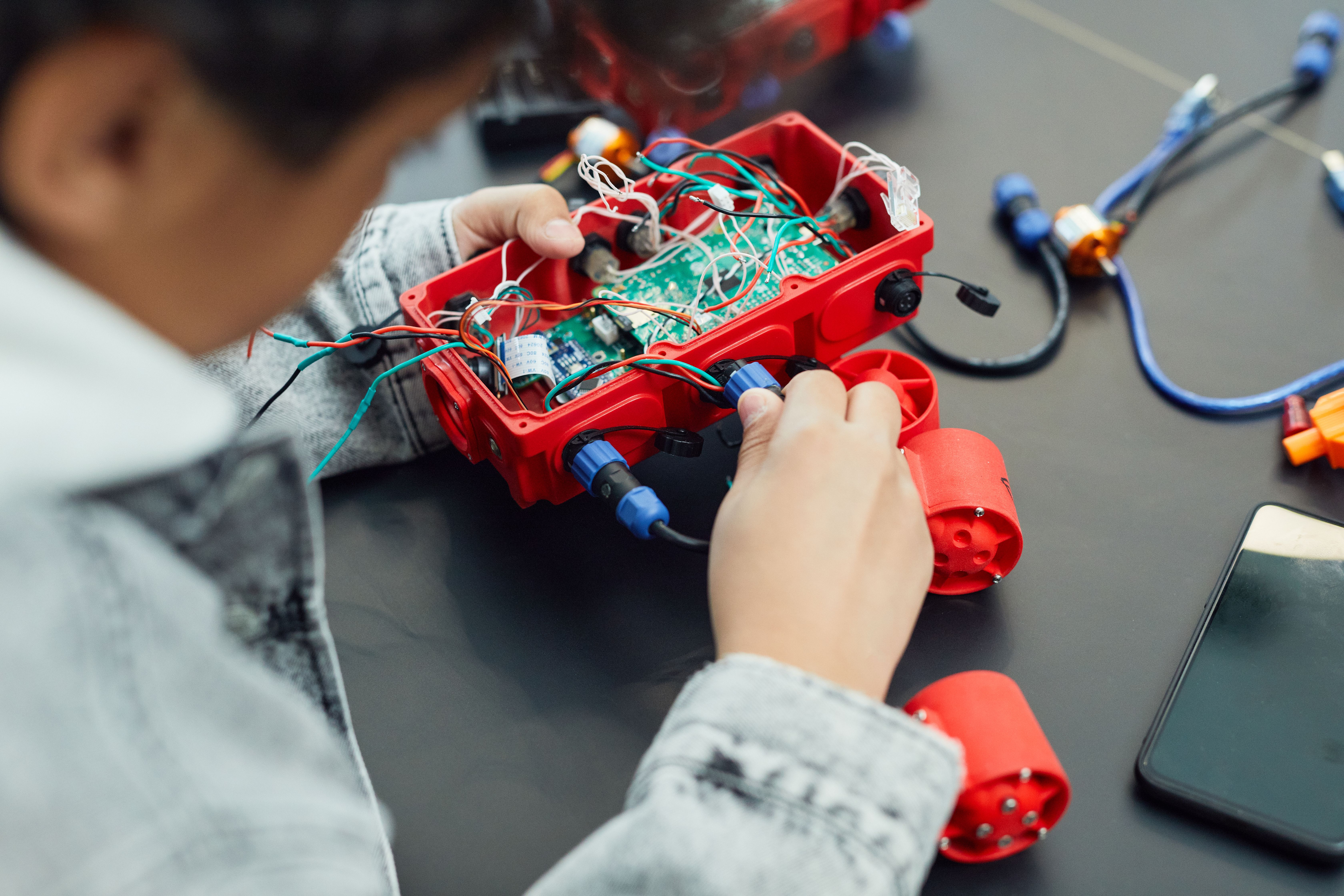 Child building a robot